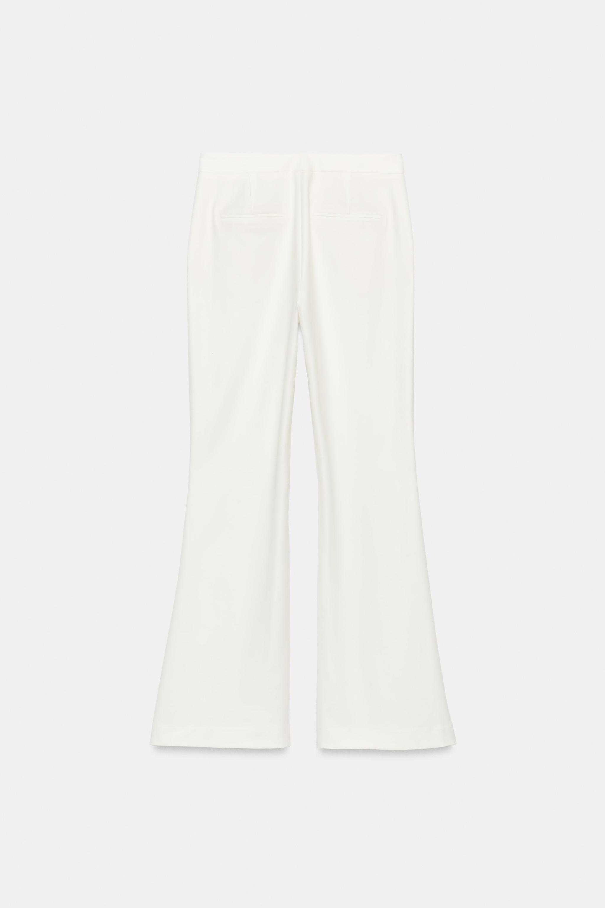 PANTS WITH SLIT HEMS